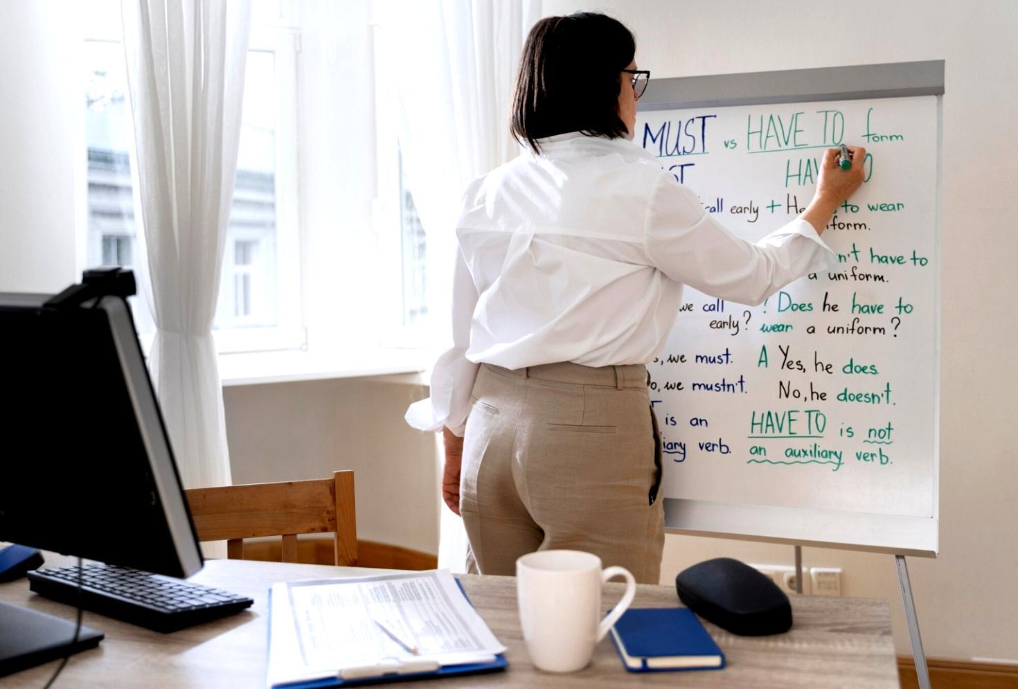 Modern office workspace with automated financial systems and analytics dashboards